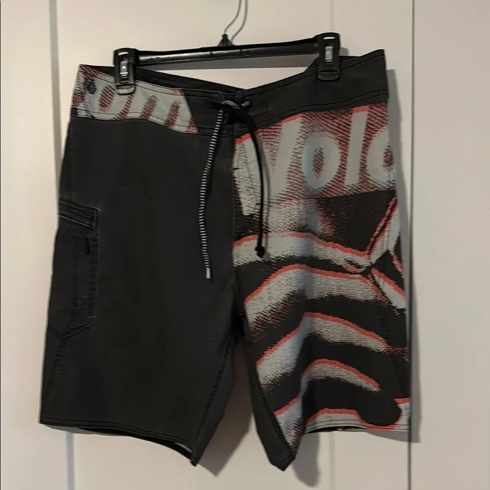 Volcom men's Black and Red Board Shorts Asymmetrical Design Size 34